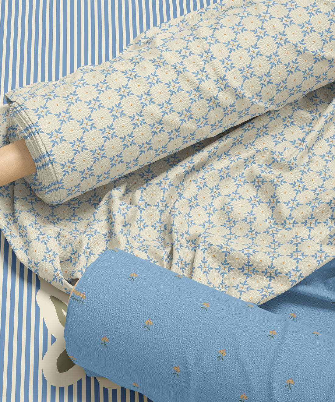 Geometric patterned fabric in blue and orange by Gray Benko Home