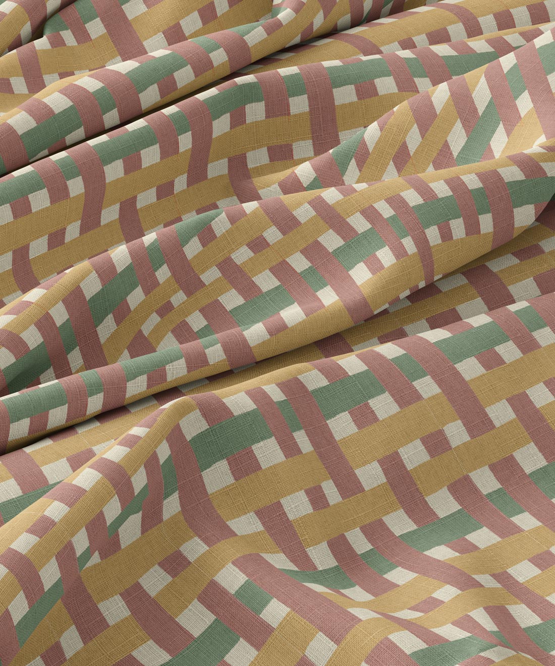 Close-up of patterned fabric with geometric design in yellow, green, and pink.