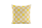Yellow and white checkered pillow on a white background