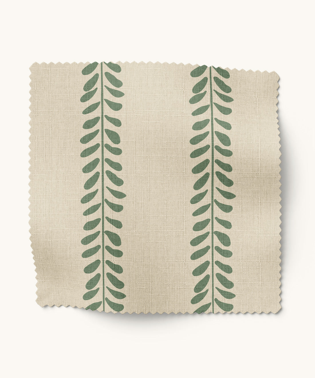 Ivory and green leaf patterned fabric