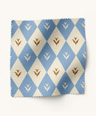 Floral, diamond patterned fabric in blue and brown