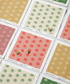 Collection of patterned cards with floral designs on a white background