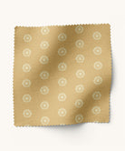 Floral patterned fabric in mustard