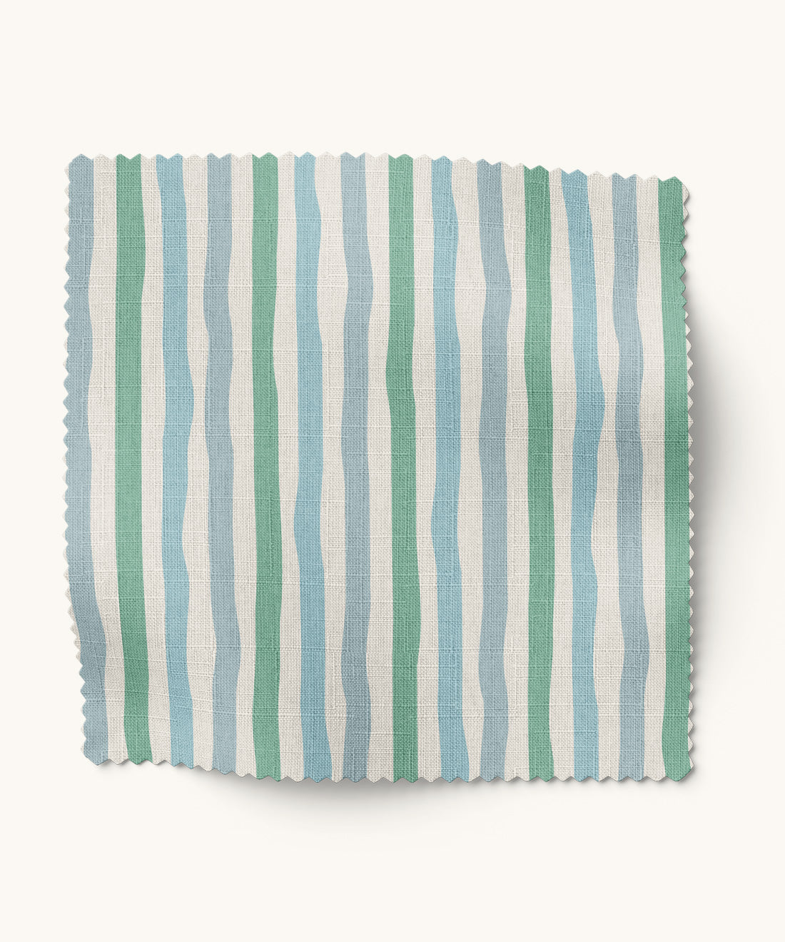 Striped fabric sample with green, blue, and white stripes on a white background