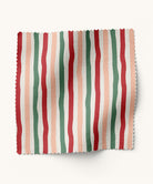 Striped fabric swatch with pink, red, and green