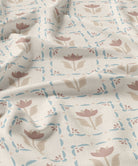 Taupe and blue floral patterned fabric