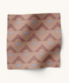 Geometric fabric in brown and blue by Gray Benko Home