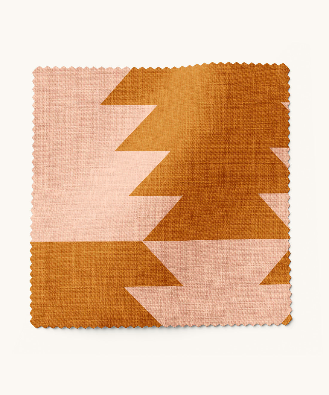 Geometric patterned fabric in auburn and peach