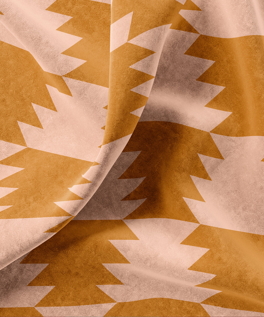 Fabric with geometric pattern in orange and peach tones