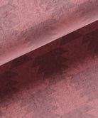 pink fabric with a subtle geometric pattern