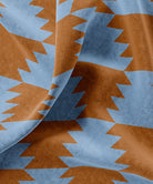 Fabric with brown and blue geometric pattern