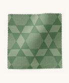 Green geometric patterned fabric swatch