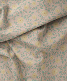 mustard and peach floral patterned fabric