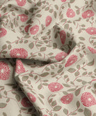 Red and green floral patterned fabric