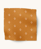 Cottagecore Fabric swatch with a subtle floral pattern on a orange background