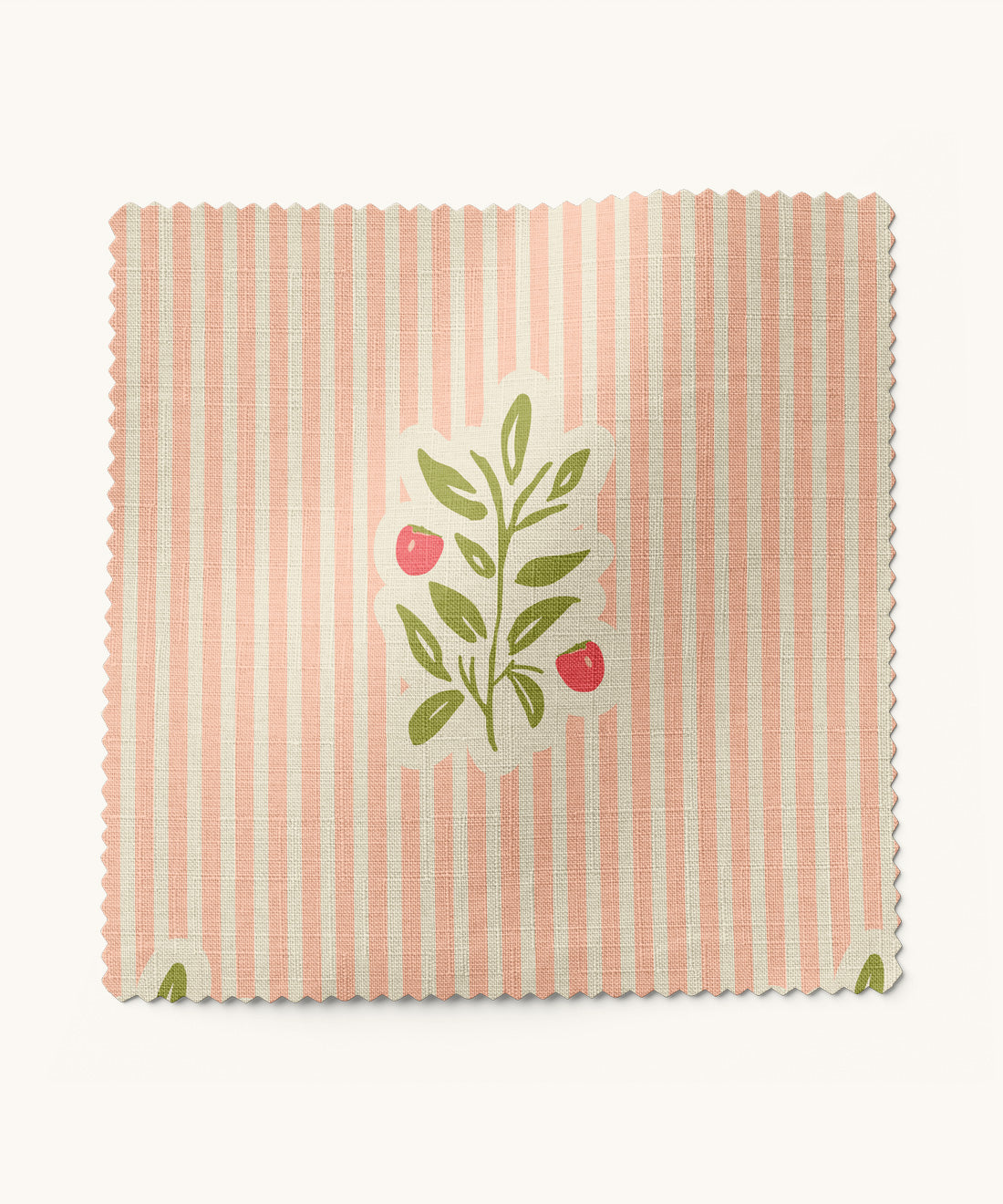 Textile sample with a floral design on a pink striped background