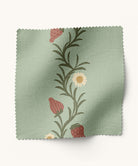 Strawberry patterned fabric in green and red
