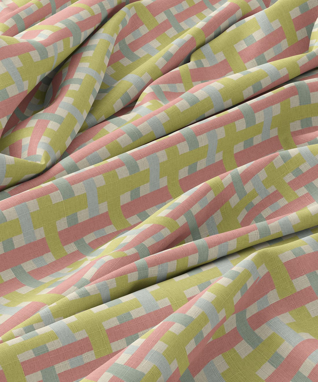 Close-up of fabric with pink and green geometric pattern