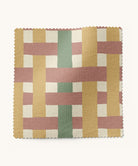 Woven patterned fabric in mustard, red, green by Gray Benko Home