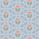 A section of wallpaper with a floral pattern featuring periwinkle and pink colors on a light blue background.