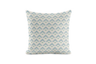 Decorative pillow with blue and green geometric pattern on a white background