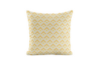 Geometric patterned pillow in yellow