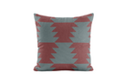 Geometric patterned pillow in burgundy and blue