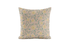 Decorative pillow with floral pattern on a light pink background