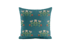 Decorative pillow with floral pattern on a teal background