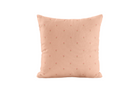 Pink pillow with subtle floral pattern on a white background