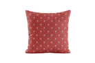 Red pillow with a small trellis pattern on a white background
